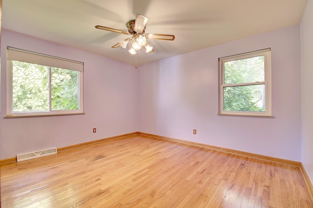 5370 Skyline Dr, Highland Heights, KY 41076 - spare room featuring healthy amount of natural light, light wood-style flooring, and a ceiling fan
