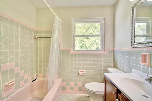 5370 Skyline Dr, Highland Heights, KY 41076 - bathroom with tile walls, shower / bath combination with curtain, vanity, a wainscoted wall, and tile patterned floors
