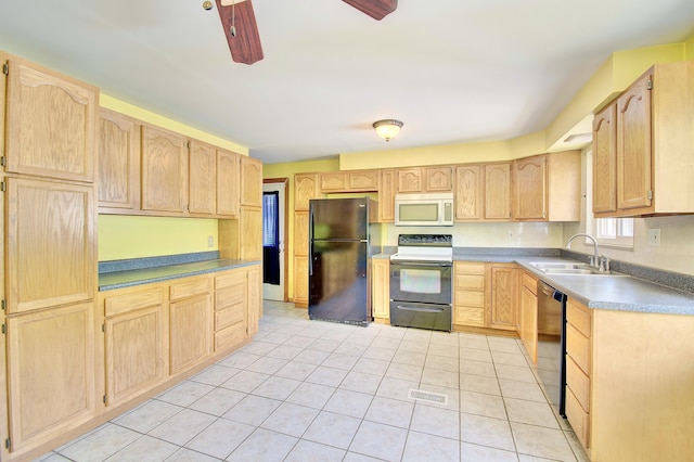 5370 Skyline Dr, Highland Heights, KY 41076 - kitchen featuring freestanding refrigerator, electric range oven, white microwave, light brown cabinets, and stainless steel dishwasher
