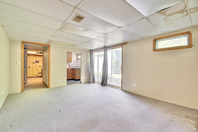5370 Skyline Dr, Highland Heights, KY 41076 - empty room with light carpet, healthy amount of natural light, and a paneled ceiling
