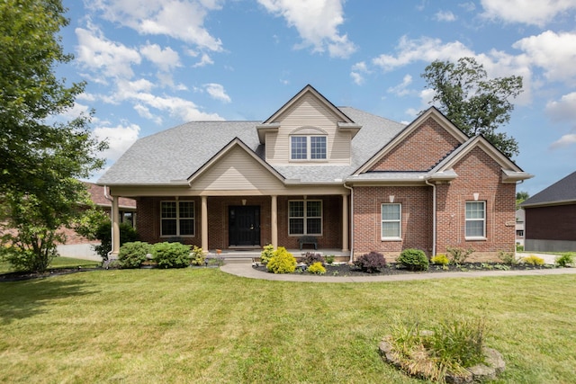 1464 Shirepeak Way, Independence, KY 41051 - craftsman-style house with brick siding, a front yard, and covered porch