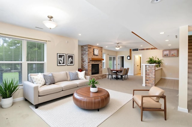 1464 Shirepeak Way, Independence, KY 41051 - living room featuring healthy amount of natural light, light colored carpet, a fireplace, recessed lighting, and stairs