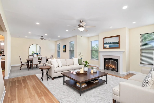1464 Shirepeak Way, Independence, KY 41051 - living room featuring a ceiling fan, light wood-style floors, a fireplace with flush hearth, recessed lighting, and healthy amount of natural light