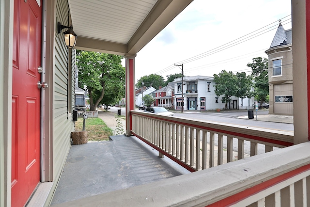 1508 Holman Ave, Covington, KY 41011 - wooden porch with a residential view