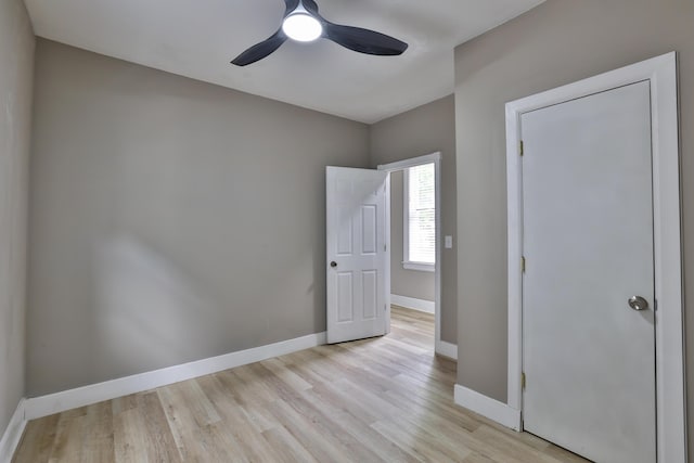 1508 Holman Ave, Covington, KY 41011 - unfurnished bedroom featuring light wood-style floors and a ceiling fan