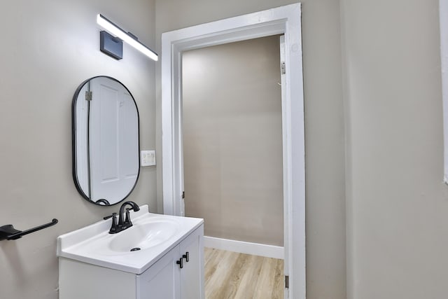 1508 Holman Ave, Covington, KY 41011 - bathroom featuring vanity and wood finished floors