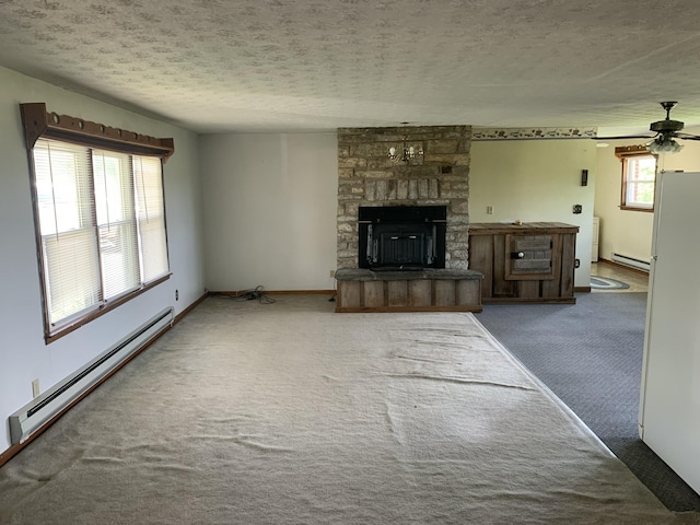 165 Davis Lake Rd, Owenton, KY 40359 - unfurnished living room featuring baseboard heating, carpet floors, a textured ceiling, a stone fireplace, and ceiling fan