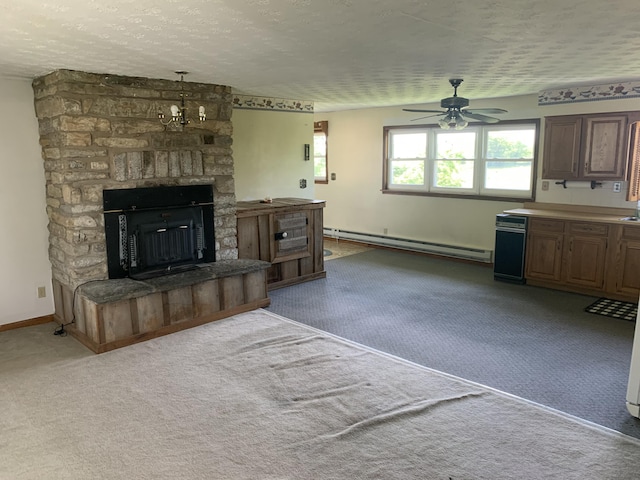 165 Davis Lake Rd, Owenton, KY 40359 - carpeted living room featuring a baseboard heating unit, ceiling fan, a textured ceiling, and a stone fireplace