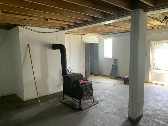 165 Davis Lake Rd, Owenton, KY 40359 - basement featuring plenty of natural light and a wood stove