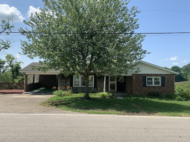 165 Davis Lake Rd, Owenton, KY 40359 - view of front of property with brick siding, a front yard, driveway, and a wooden deck