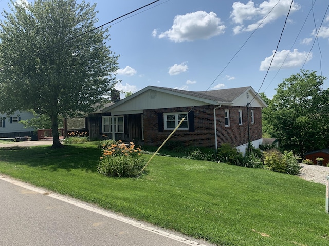 165 Davis Lake Rd, Owenton, KY 40359 - view of front of house featuring brick siding, a front yard, and a chimney