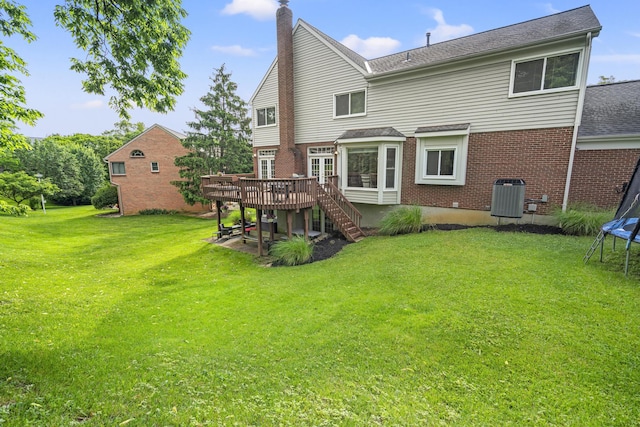 25 Regiment Ct, Wilder, KY 41076 - back of house featuring a wooden deck, brick siding, a chimney, and stairway