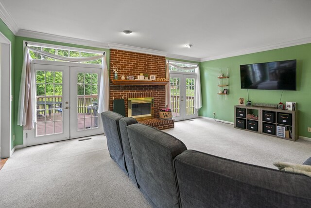 25 Regiment Ct, Wilder, KY 41076 - living area featuring french doors, ornamental molding, carpet flooring, and a brick fireplace