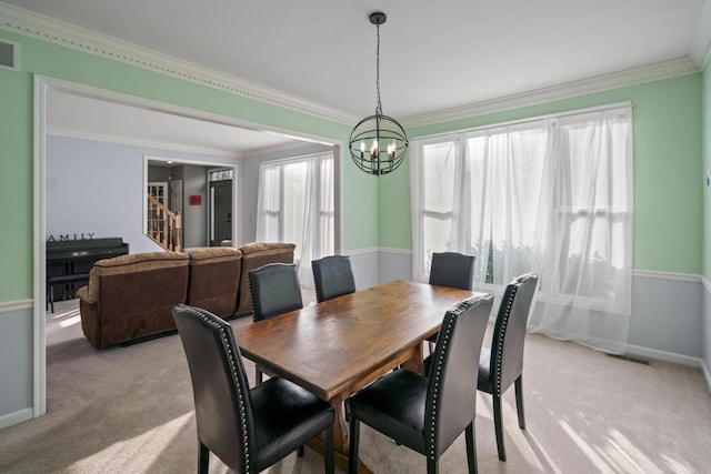25 Regiment Ct, Wilder, KY 41076 - dining room featuring a chandelier, light colored carpet, ornamental molding, and stairs