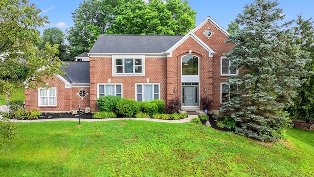 25 Regiment Ct, Wilder, KY 41076 - view of front facade with a front lawn, a shingled roof, and brick siding