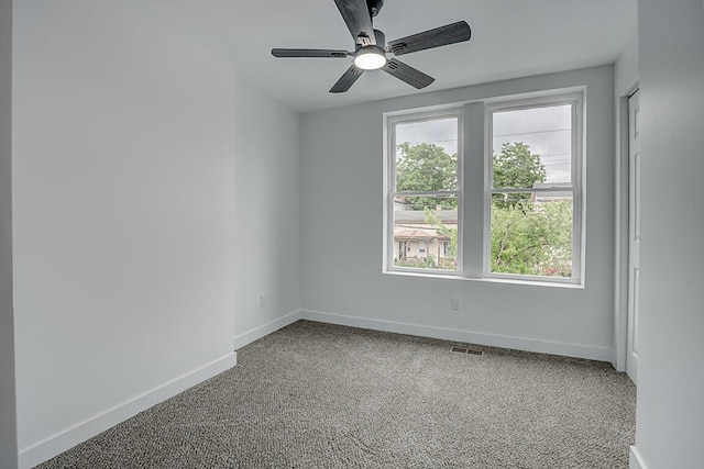 1233 Scott St, Covington, KY 41011 - empty room with carpet floors and ceiling fan