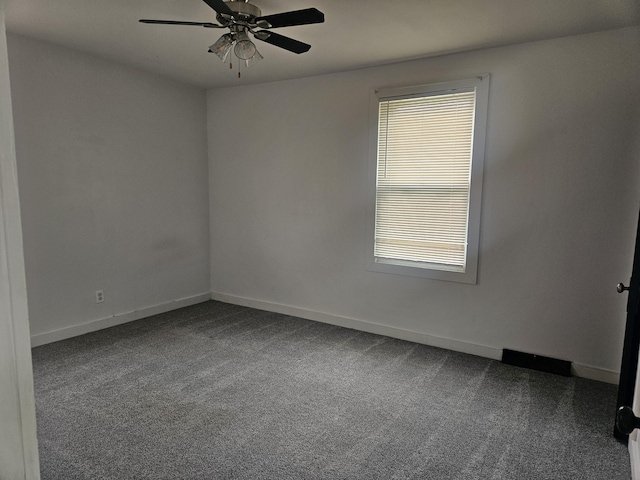 330 Silver St, Dayton, KY 41074 - empty room with dark carpet and ceiling fan