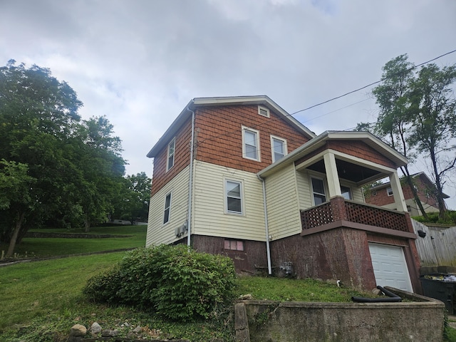 330 Silver St, Dayton, KY 41074 - view of property exterior featuring an attached garage and a yard