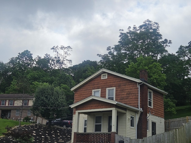 330 Silver St, Dayton, KY 41074 - view of front of home featuring a chimney and covered porch