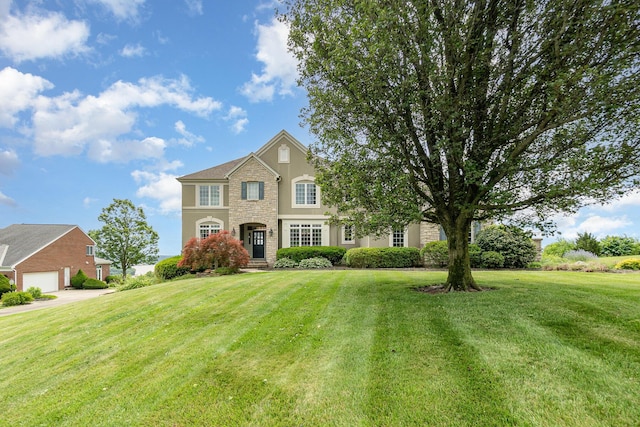 2316 Pinnacle Ct, Hebron, KY 41048 - traditional-style home with stone siding, stucco siding, and a front yard