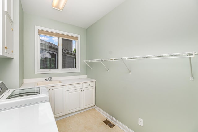 2316 Pinnacle Ct, Hebron, KY 41048 - laundry room featuring cabinet space and independent washer and dryer