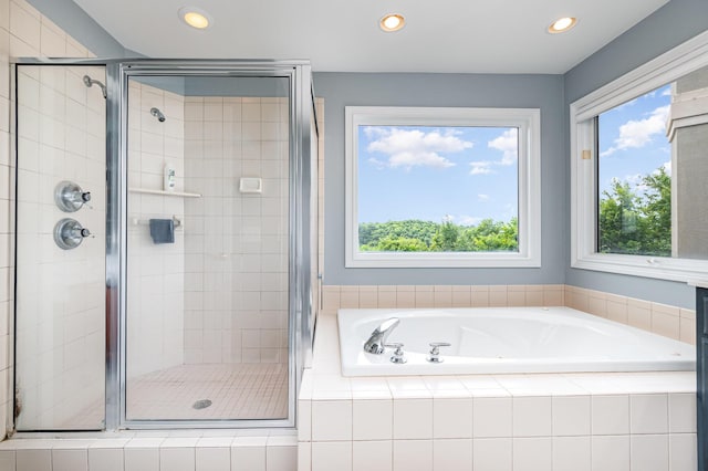 2316 Pinnacle Ct, Hebron, KY 41048 - bathroom featuring a bath, a shower stall, healthy amount of natural light, and recessed lighting
