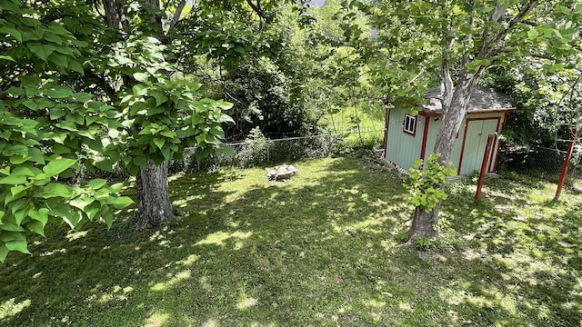 38 Carriage Hill Dr, Erlanger, KY 41018 - fenced backyard featuring a storage unit
