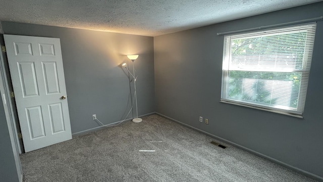 38 Carriage Hill Dr, Erlanger, KY 41018 - empty room featuring a textured ceiling and carpet flooring