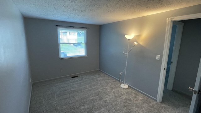 38 Carriage Hill Dr, Erlanger, KY 41018 - carpeted spare room with a textured ceiling and baseboards