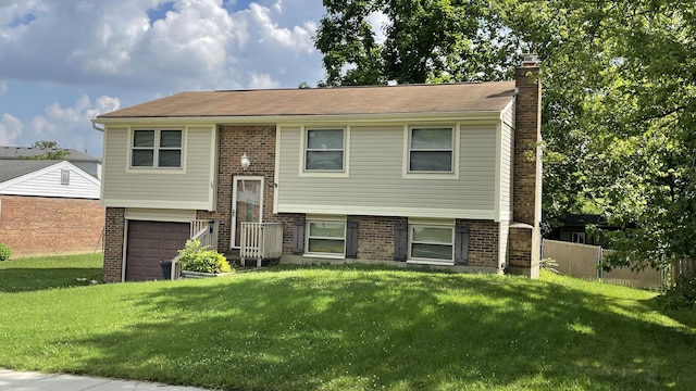 38 Carriage Hill Dr, Erlanger, KY 41018 - bi-level home with brick siding, a chimney, and a garage
