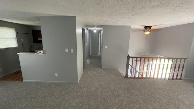 38 Carriage Hill Dr, Erlanger, KY 41018 - spare room featuring carpet floors, a ceiling fan, and a textured ceiling