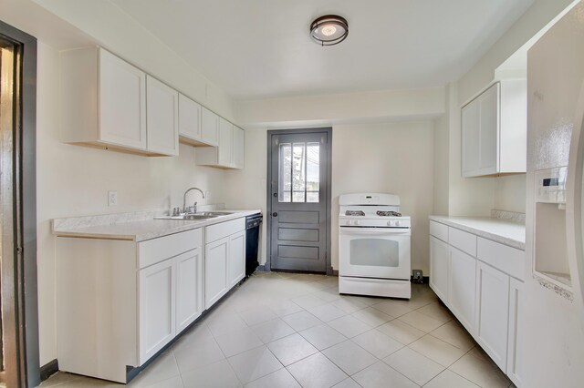 2 Doris Dr, Latonia, KY 41015 - kitchen with white appliances, light countertops, white cabinets, and light tile patterned flooring