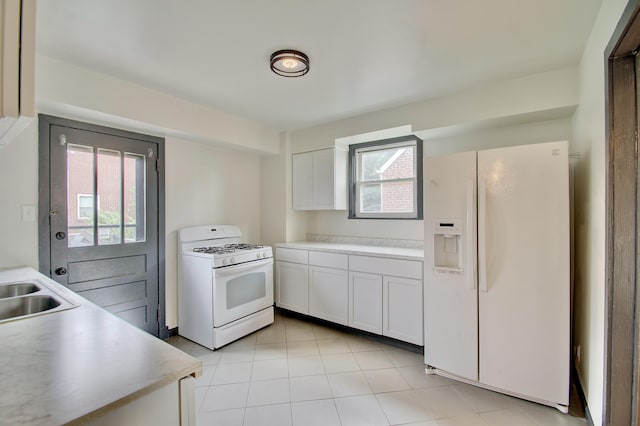 2 Doris Dr, Latonia, KY 41015 - kitchen with white appliances, light countertops, white cabinets, and light tile patterned flooring