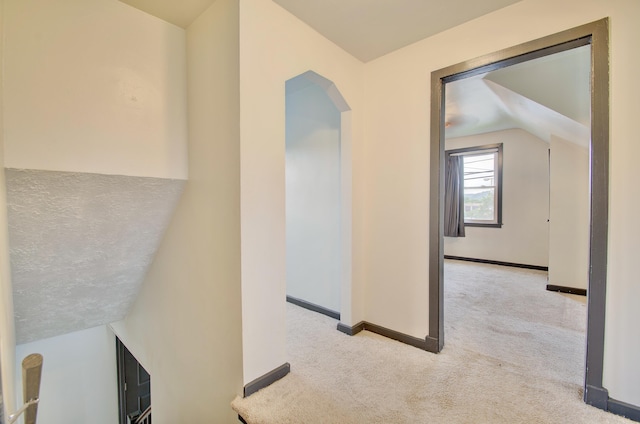 2 Doris Dr, Latonia, KY 41015 - corridor featuring carpet floors, arched walkways, and lofted ceiling