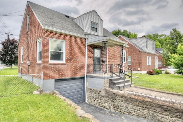 2 Doris Dr, Latonia, KY 41015 - view of front of house with brick siding, an attached garage, asphalt driveway, and roof with shingles