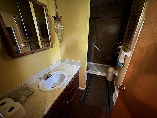4120 Taylor Ct, Erlanger, KY 41018 - bathroom featuring vanity, wood finished floors, and shower / washtub combination