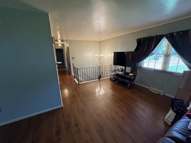 4120 Taylor Ct, Erlanger, KY 41018 - living area with a chandelier and wood finished floors