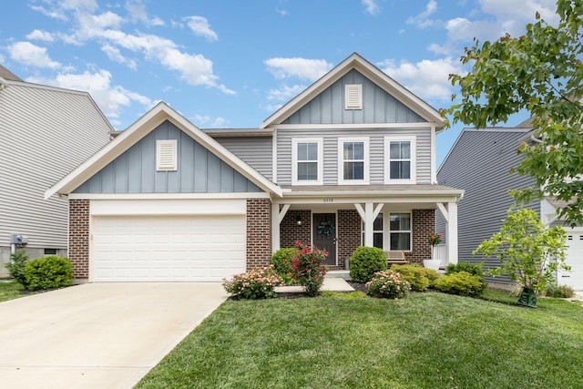 6638 Glencree Ln, Union, KY 41091 - view of front facade with board and batten siding, an attached garage, a front yard, and brick siding