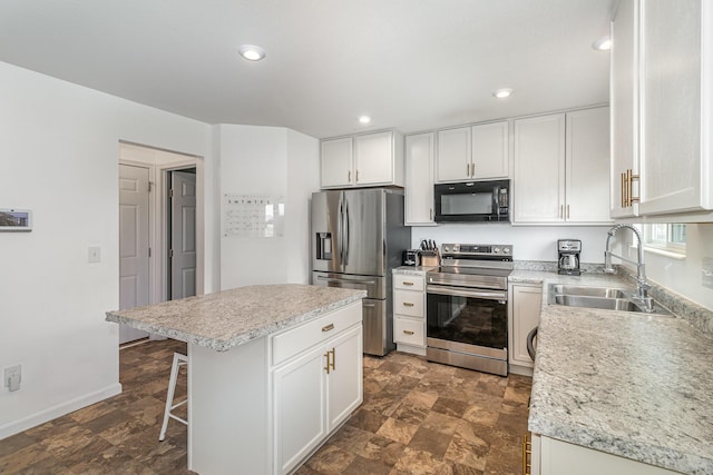 6638 Glencree Ln, Union, KY 41091 - kitchen with stainless steel appliances, light countertops, white cabinets, and recessed lighting