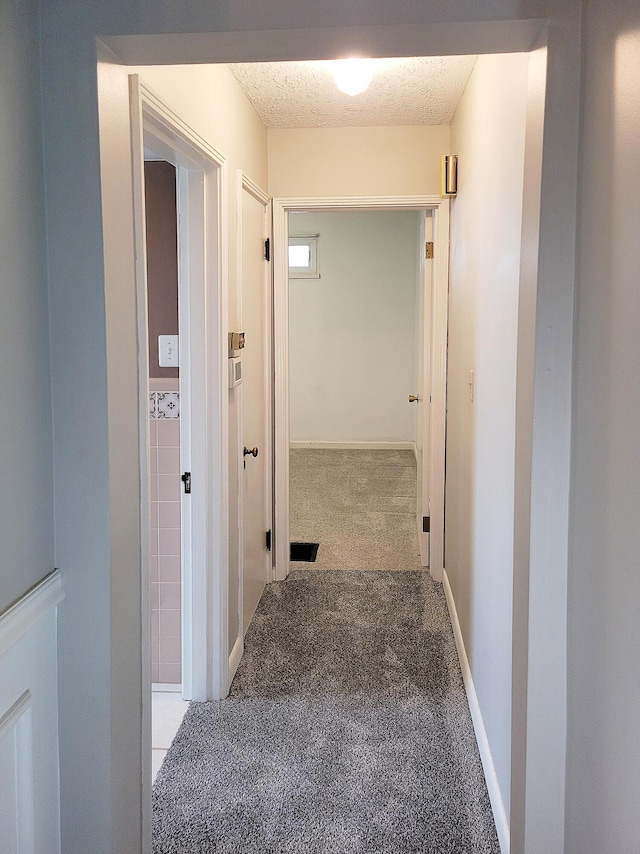 107 Timberlake Ave, Erlanger, KY 41018 - hallway with carpet floors and a textured ceiling