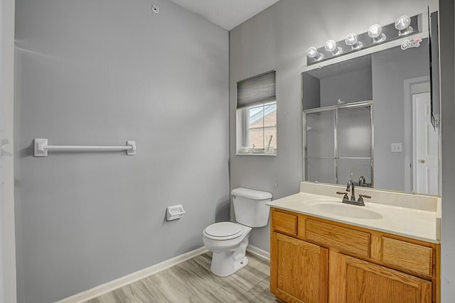 150 Saddlebrook Ln Unit 535, Florence, KY 41042 - full bath with vanity, an enclosed shower, and wood finished floors