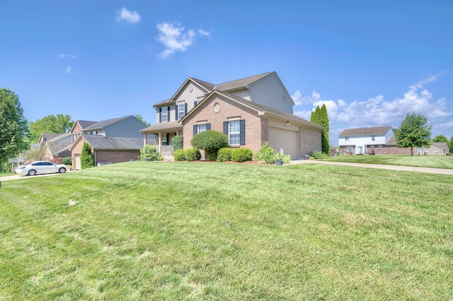1025 Wakefield Ct, Hebron, KY 41048 - traditional-style house featuring brick siding, a garage, a front lawn, and driveway