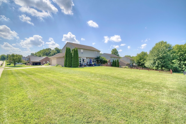 1025 Wakefield Ct, Hebron, KY 41048 - view of grassy yard featuring a garage