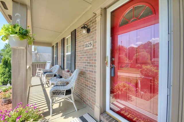 1025 Wakefield Ct, Hebron, KY 41048 - doorway to property featuring a porch and brick siding
