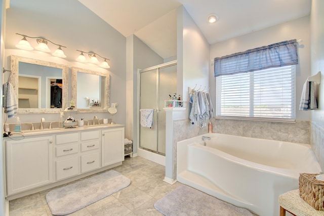 1025 Wakefield Ct, Hebron, KY 41048 - bathroom with a garden tub, a shower stall, double vanity, a walk in closet, and lofted ceiling