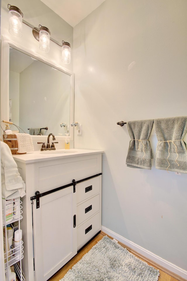 1025 Wakefield Ct, Hebron, KY 41048 - bathroom with vanity and wood finished floors