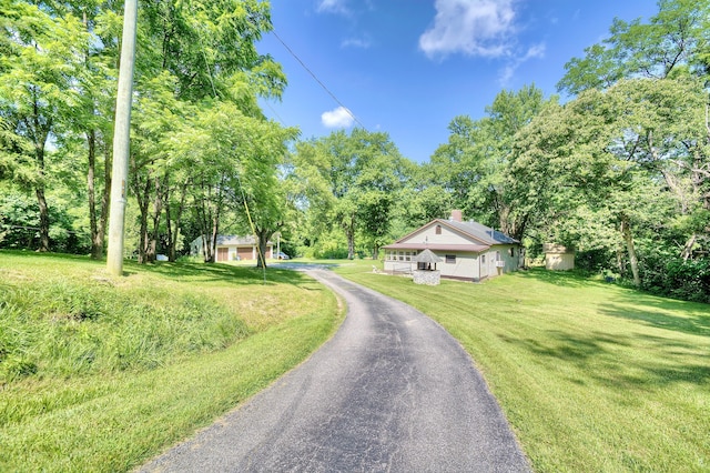604 Rifle Range Rd, Alexandria, KY 41001 - view of asphalt driveway featuring view of wooded area