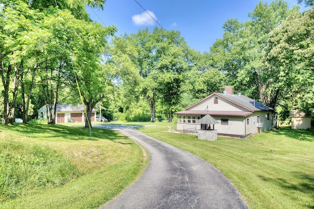 604 Rifle Range Rd, Alexandria, KY 41001 - view of asphalt driveway featuring view of scattered trees