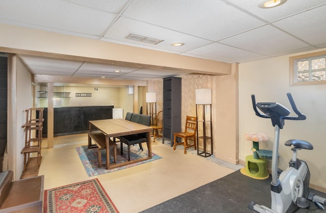 305 Helen St, Ludlow, KY 41016 - dining space featuring a paneled ceiling, a dry bar, and concrete flooring