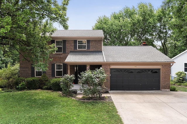 123 Lookout Farm Dr, Crestview Hills, KY 41017 - view of front facade featuring an attached garage, a front yard, concrete driveway, brick siding, and roof with shingles